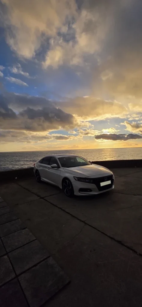 Honda Accord rental car by the Atlantic ocean in Madeira