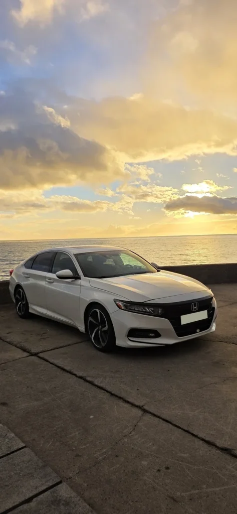 Honda Accord rental car at sunset on the coast of Madeira